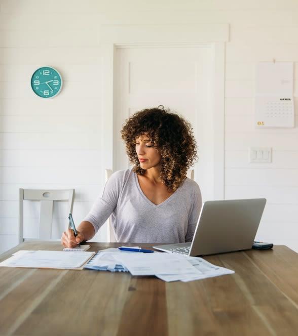 Client preparing making notes about auto refinance