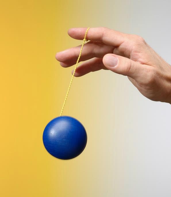 Holding a Yo-Yo in a hand