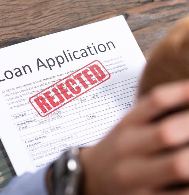 Car loan application with a Rejected stamp