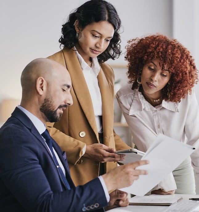 Financial advisors providing consultation to a businessman